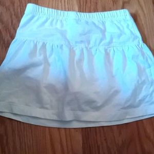 White skirt with shorts underneath